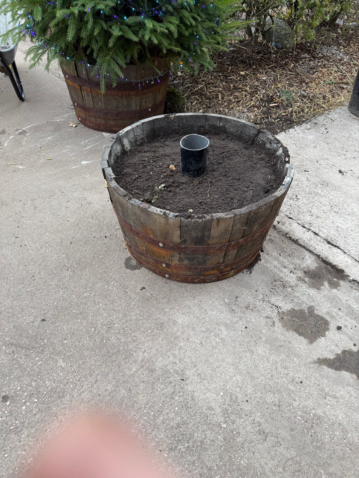 Whiskey barrel stand, a semi permanent solution to display trees